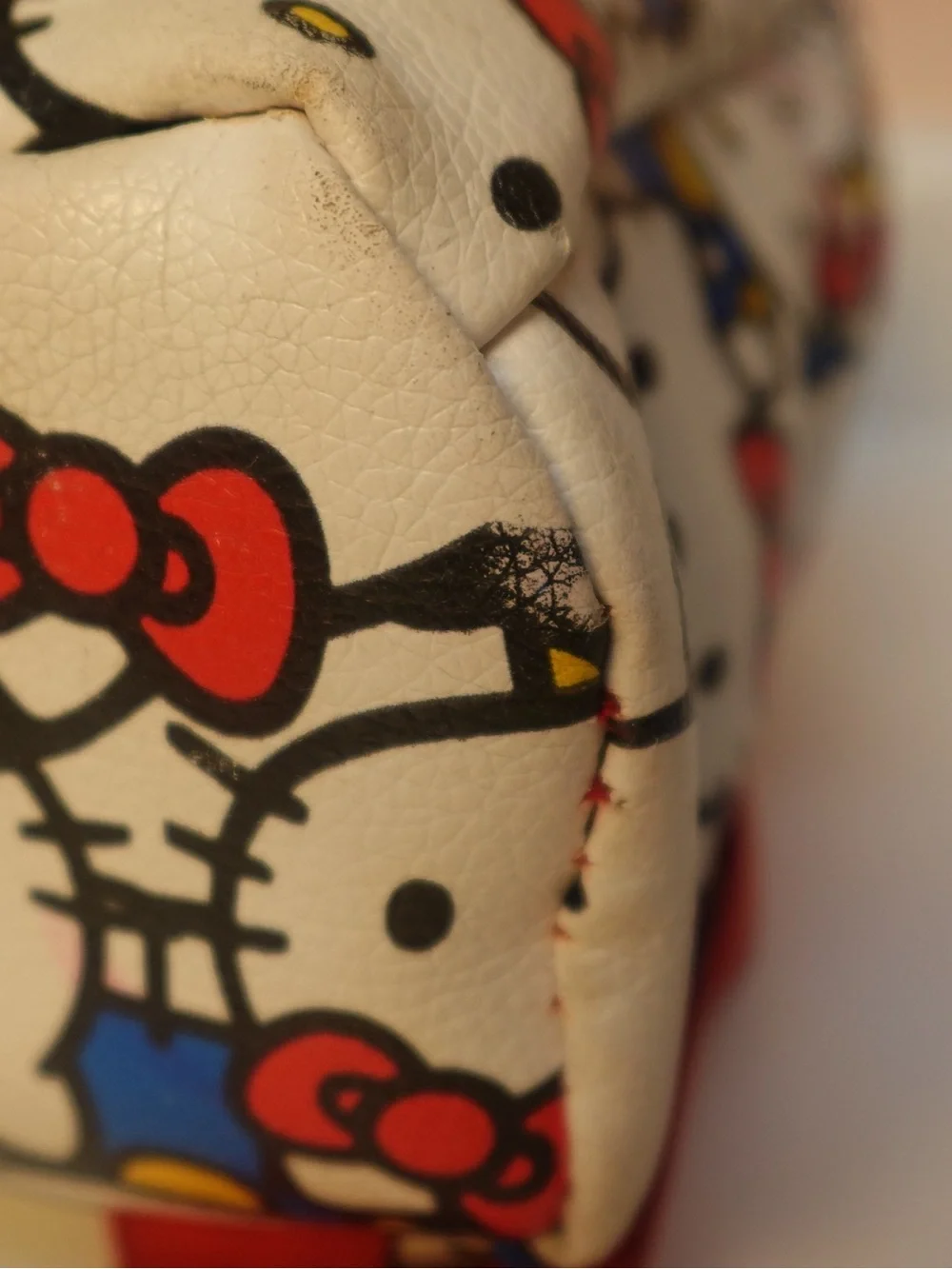 Hello Kitty White Backpack with Red Bows and Blue Outfits